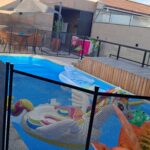 Cerca de piscina ProtectPool com portão automático instalada na Ponte do Imaruim Palhoça